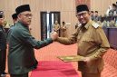 Bupati Sumenep Dr. H. Achmad Fauzi Wongsojudo (kanan) bersama Ketua DPRD Sumenep 