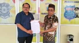 Kuasa hukum pelapor, Rahman, SH (kiri) bersama Klien nya Subandrio 