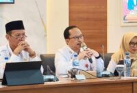 Kepala Bappeda Sumenep, Dr. Arif Firmanto (tengah)