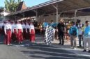 Pelepasan peserta lomba gerak jalan tingkat SD/MI oleh Camat Bluto