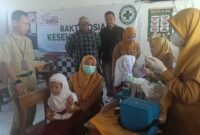 Kegiatan cek Kesehatan SMSI Lamongan untuk para pelajar 