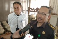 Kasi Intel Kejari Bondowoso, Adi Harsanto bareng Kadisdik Taufan Restuanto