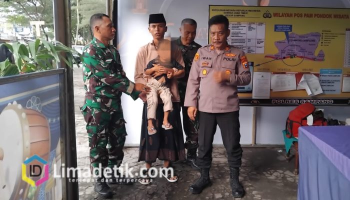 Pos Pengamanan Polres Sampang Berhasil Pertemukan Bocah dengan Keluarganya Saat Liburan di Pantai Camplong